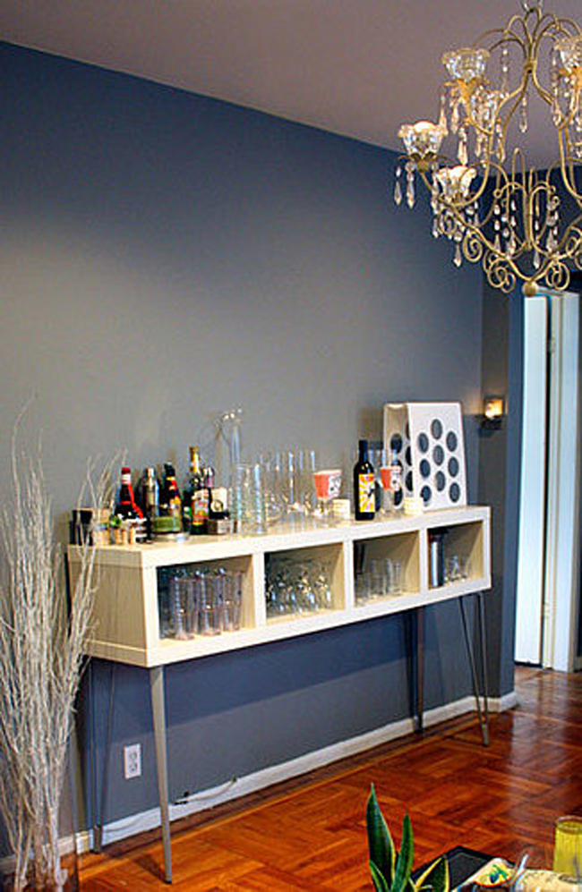 14.) Turn a bookcase on its side to <a href="https://www.casasugar.com/Cool-Idea-Ikea-Bookcase-Turned-Bar-7257050" target="_blank">create a cozy bar</a>.