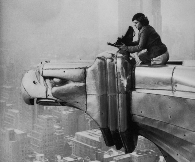 15.) Margaret Bourke-White climbing on the Chrysler Building to take a photograph in 1934.