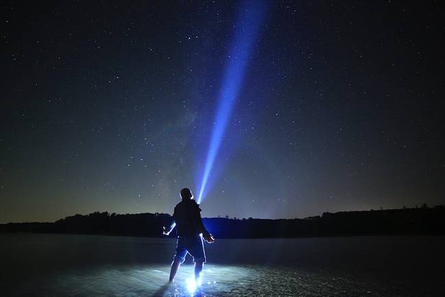 A flashlight and a person