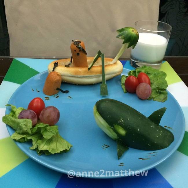 A breakfast sausage goes fishing in a sea of delicious fruits and vegetables.