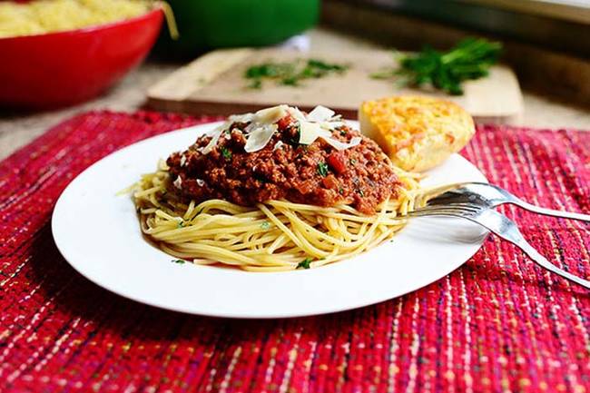 Tomato sauce in a jar is bland, but add oregano, thyme, green peppers and some ground beef for that from-scratch taste. See more suggestions on 
<a href="https://thepioneerwoman.com/cooking/2012/09/spaghetti-sauce/">The Pioneer Woman</a>.