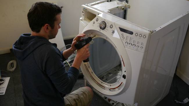 He also had to install a new front window on the washing machine. He didn't want anyone to be able to just walk up and open the fish tank like a washing machine. That would be bad.