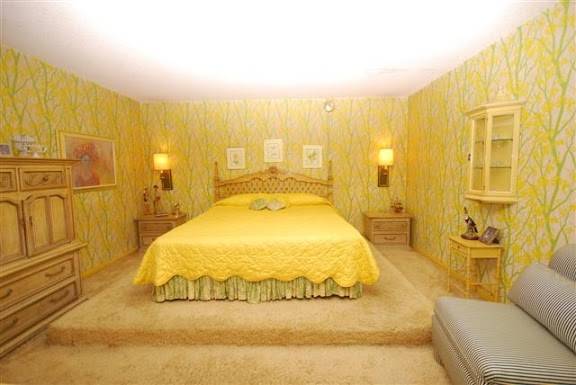 Blinding yellow seems the opposite of a relaxing bedroom, but maybe that's what they were going for.