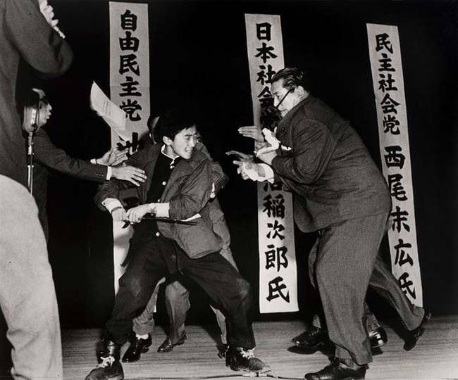 17-year-old Yamaguchi assassinates socialist politician, Asanuma, by stabbing in Tokyo, 1960.