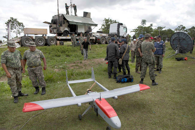 The war on the rainforest is now a real one.