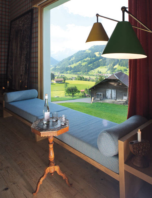 Nestled in the hills of Switzerland, living by the railroad tracks never looked so good. This is an idyllic location.