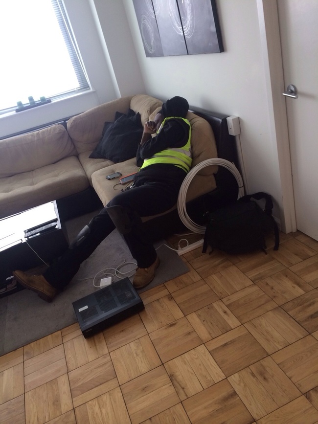 1) Off to a good start already!  This Time Warner technician fell asleep on some dude's couch.