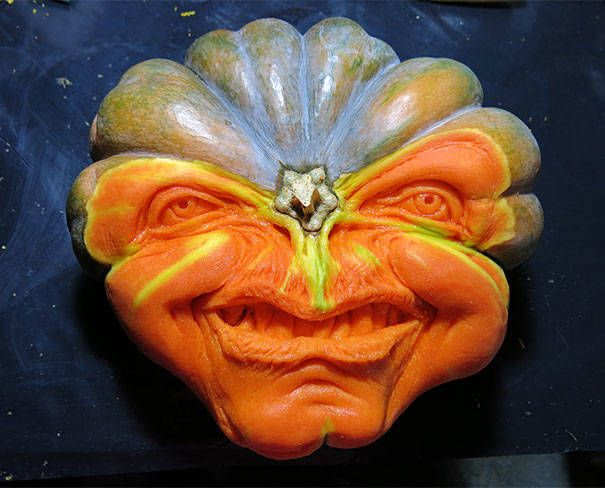 Neill's carving isn't limited to pumpkins, and he'll use the natural features of the squash in the carvings as well.