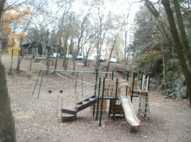 2.) Maple Hill Cemetery, Huntsville, Alabama: For some unexplained reason this cemetery has a playground, and supposedly the children of the local cemetery spooks like to play here after dark. People claim to see swings moving on their own and the sounds of invisible giggling kids in the night.