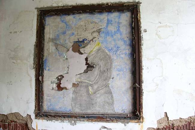 Inside some of the crumbling buildings are pieces of patient art from before the hospital closed down.