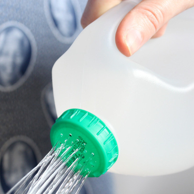 Use old milk cartons to make watering jugs.