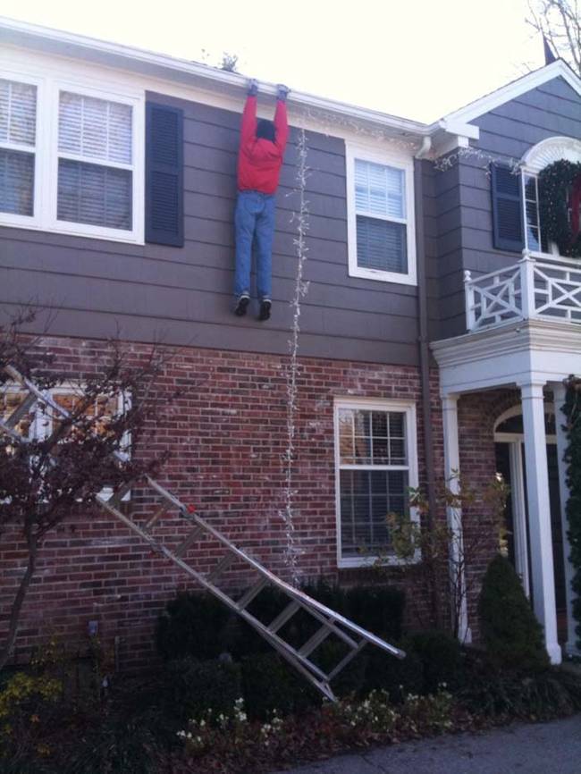 Someone should really help him. Oh, it's a Christmas decoration.