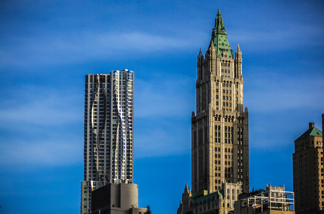 8 Spruce Street and the Woolworth Building in New York, New York.