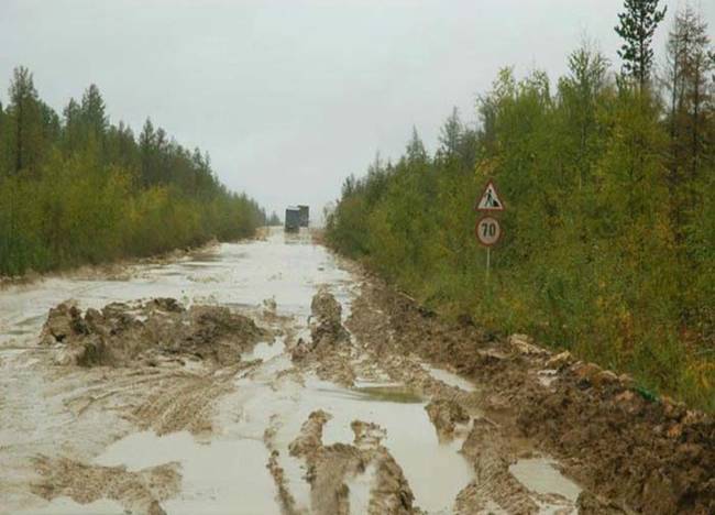 The posted speed limit is 70 kilometers per hour (about 45 MPH here), but a commuter would be lucky to make less than half that speed in these conditions.