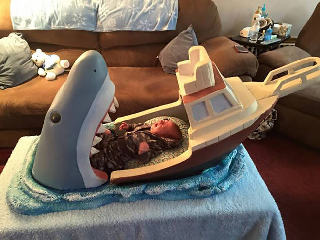 Reginella made this crazy crib so it would look as if the baby was getting swallowed by Jaws.