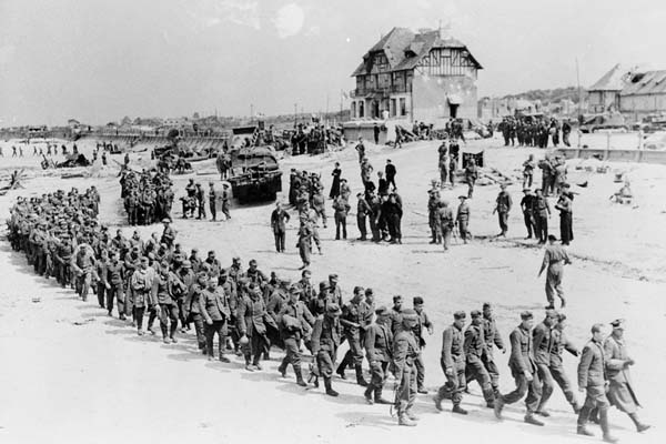 German prisoners-of-war march along Juno Beach.