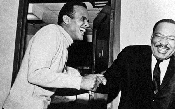 A Moment of Laughter: Civil Rights figures Harry Belafonte and Martin Luther King Jr. share a laugh.