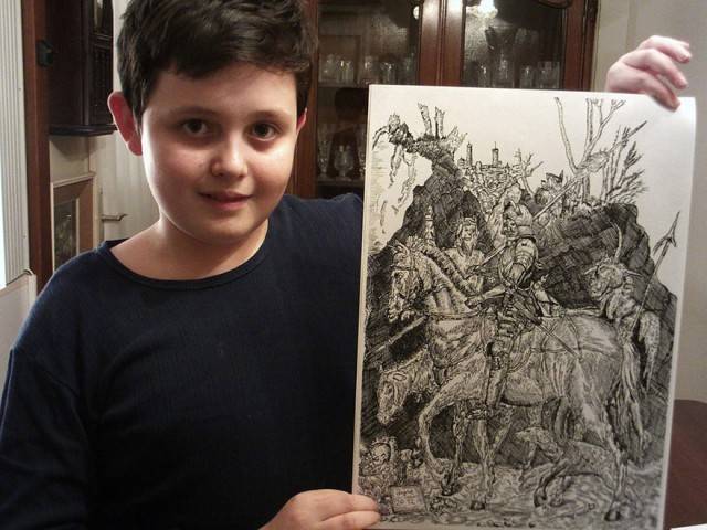 Dušan with another one of his completed and amazing sketches.