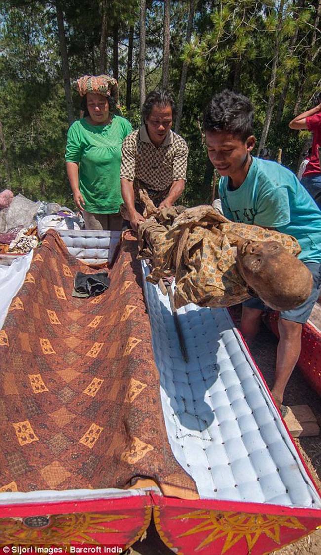 The corpses' coffins are also repaired during the ceremony.