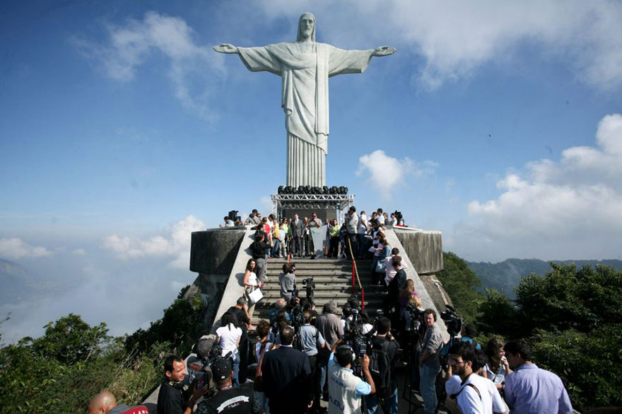 It took the 31-year-old almost half an hour to reach the summit of 124ft-high statue, climbing narrow steps where a single misplaced move would have resulted in serious injury, or worse.