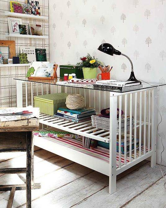 Convert an old crib into a desk.