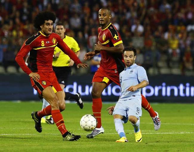 He looks like the world's tiniest soccer player.