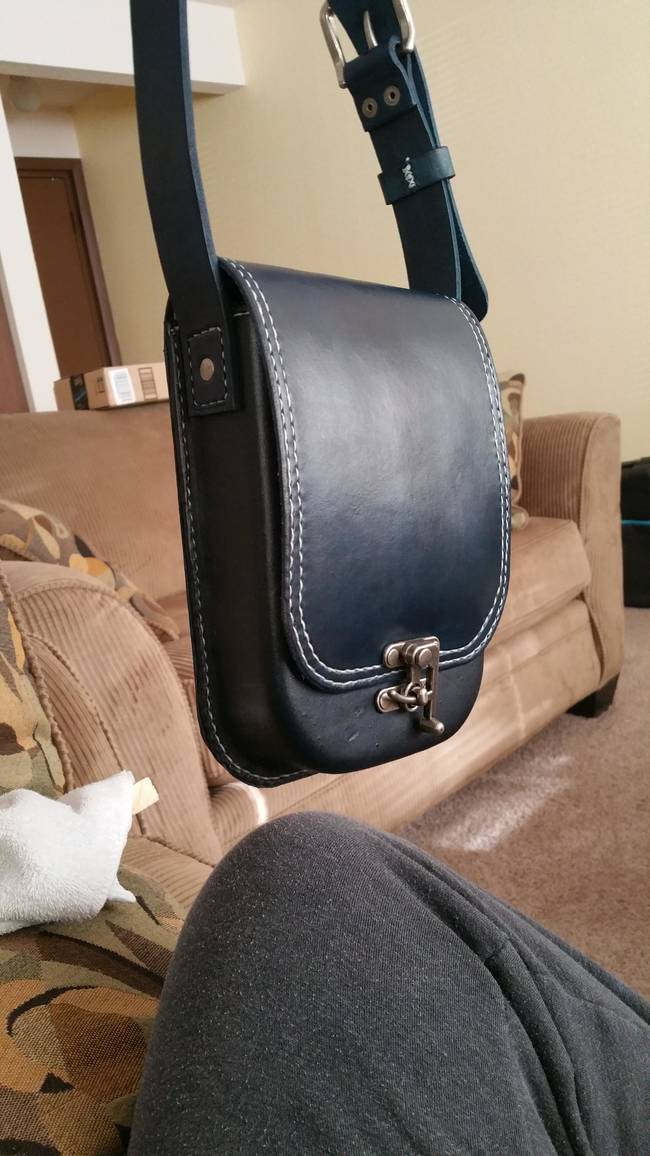 Here's the finished product. The saddle stitch and all of the tiny details he added make this purse look like something you'd find in a cute boutique!