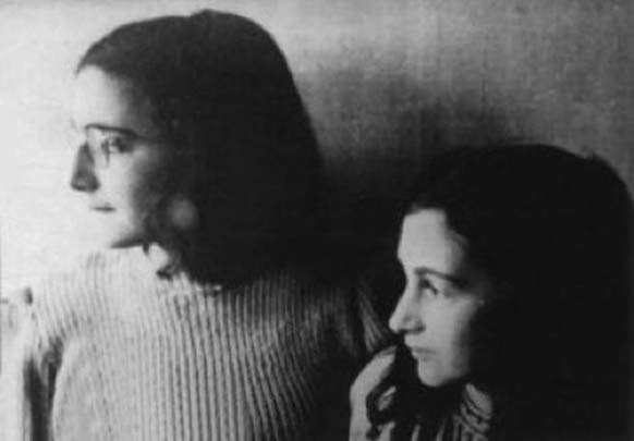 11.) This is supposedly the last photo of Anne Frank. She stands with her sister Margot in early-to-mid 1942. This was taken before her family were discovered and arrested on August 4th, 1944.