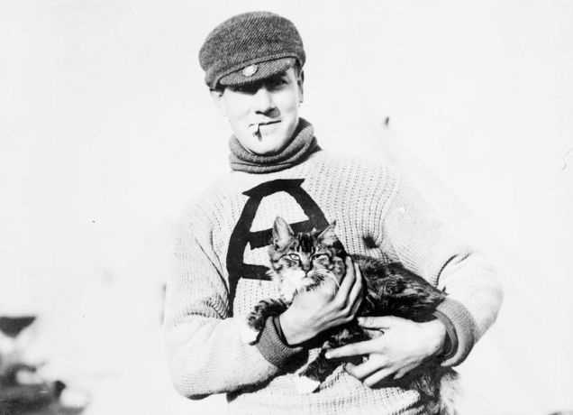 1.) A Canadian soldier with his unit's mascot, Tabby.