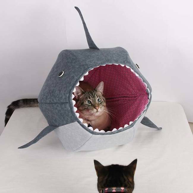 Look out, kitty! You're about to be eaten by a shark! JK...but I'm about to die over how adorable this DIY shark bed is.