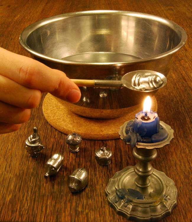 Then drop the melted lead into a bowl of cool water. Unlike what you'd expect, the lead makes an explosive pop sound when it touches the water instead of steaming.