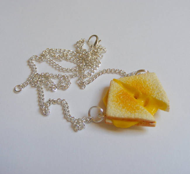 <a href="https://www.etsy.com/listing/119379931/food-jewelry-grilled-cheese-miniature?ref=sr_gallery_13&ga_search_query=food&ga_order=most_relevant&ga_page=3&ga_search_type=handmade&ga_view_type=gallery" target="_blank">Grilled Cheese Necklace</a>