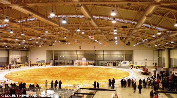 The world's largest pizza (130 feet wide) was made by 5 Italian chefs in Rome in 2012.