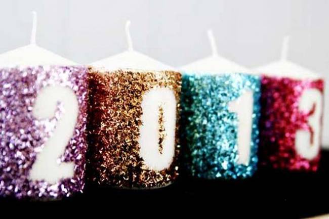 4.) Glittery candles make for eye-catching New Year's Eve decorations (just make sure to use the right year).