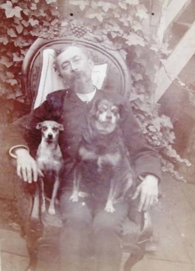 4.) One of the most common ways they did this was posing people with their favorite things (like this man in a chair with his dogs).