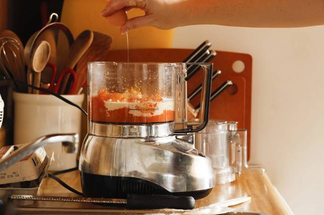 Even if the recipes are old, the cooking method doesn't have to be. Connell and Nicosia make allowances for modern convenience. This food processor is holding the ingredients to carrot pudding, which is something like a pumpkin pie in its consistency.