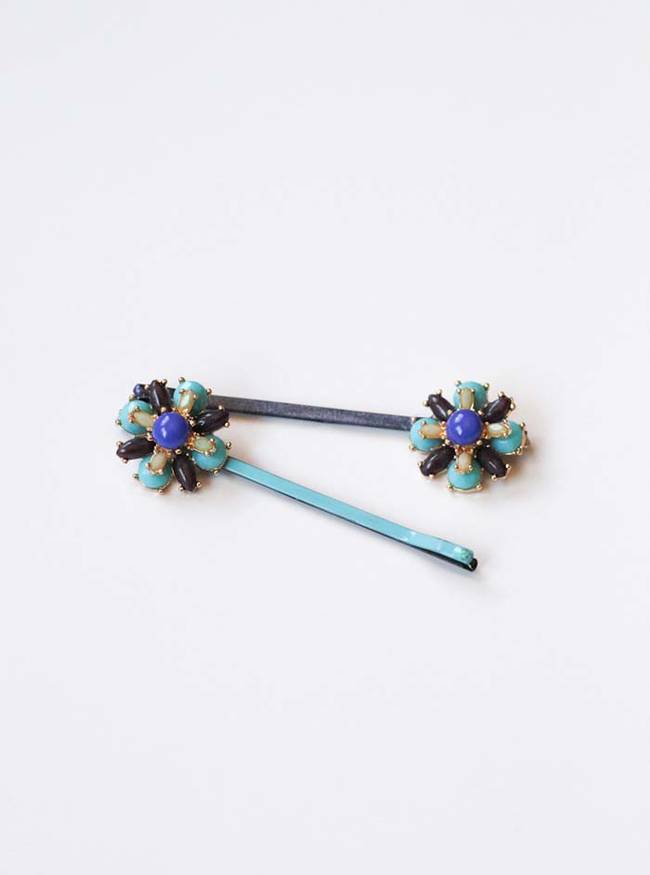 A pair of earring you no longer wear can be used to embellish hair pins.