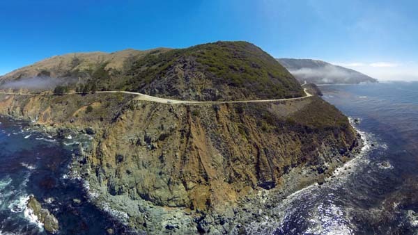 24.) Highway 1 winding around the cliffs (Big Sur, California).