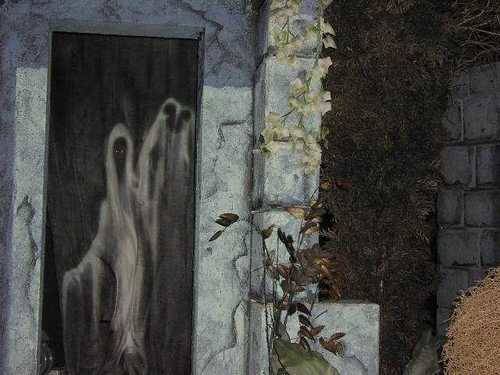 20.) Haunted House - Ghost Hand Hidden Mickey