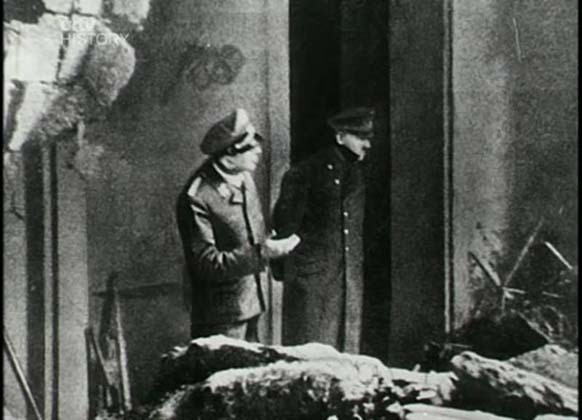 4.) This photo of Adolf Hitler was taken approximately two days prior to his death. He was standing outside of his Berlin bunker, surveying the damage a bomb had done.