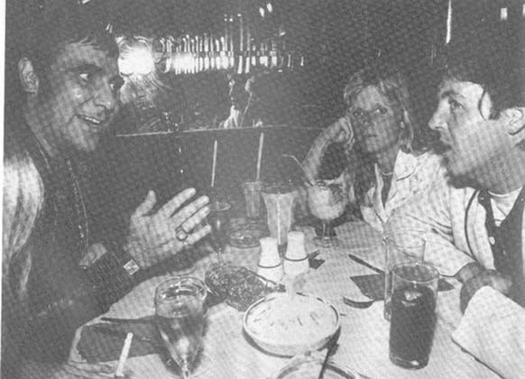 18.) The Who drummer, Keith Moon, died on September 7, 1978. He overdosed on a drug prescribed to combat alcoholism. This is him at dinner.