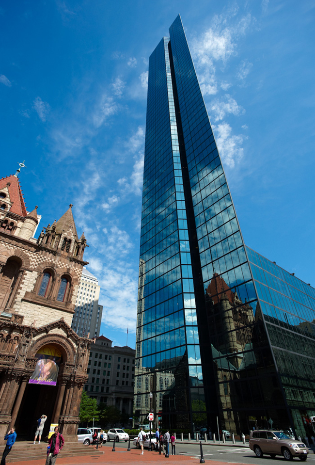 Trinity Church and the Hancock Tower in Boston, Massachusetts.