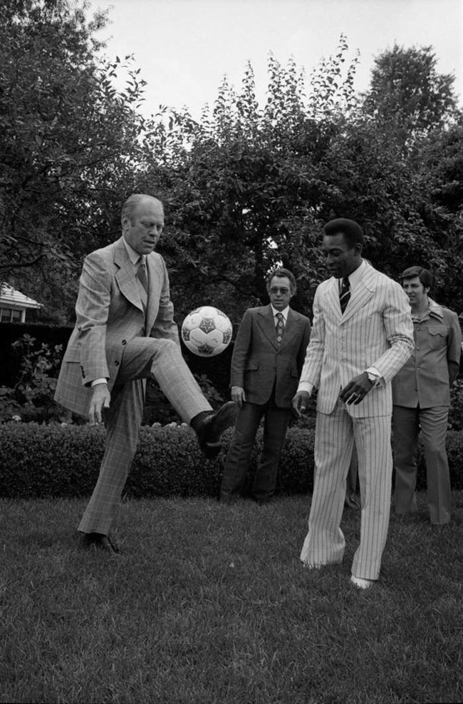 7.) Gerald Ford playing soccer with Pele.