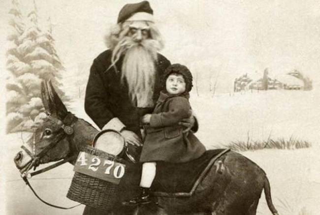 More evil-looking Santas and children on donkeys. Was this actually a thing?