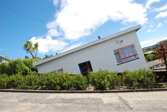 Here's the same house at another angle. The camera here is aligned with the street. That's insanely steep.