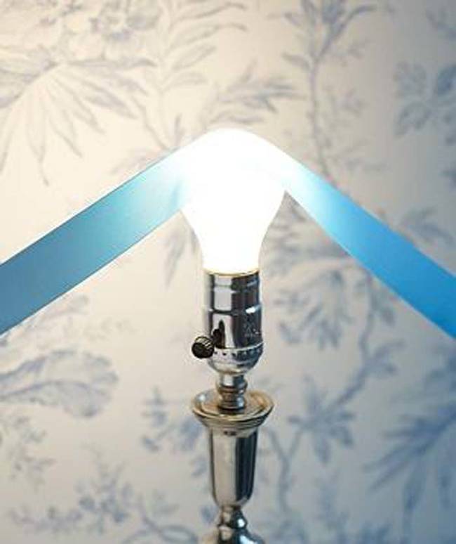 8.) Did you save your ribbons from last year? Remove the wrinkles by <a href="https://www.realsimple.com/new-uses-for-old-things/new-uses-holidays-0/smoothribbonoveralightbulb" target="_blank">rubbing the ribbon on a warm lightbulb</a>.