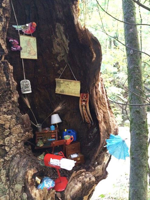 The post office in June 2014, after hikers redecorated and added some touches of their own. The map of Great Britain, the birds, and some of the other details were gifts left to spruce the place up.