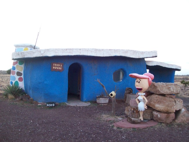 And the Flintstones' house, with Wilma. The figures in front of the houses used to play recorded dialogue when a pressure plate was activated by a tourist, but these have been disabled. 