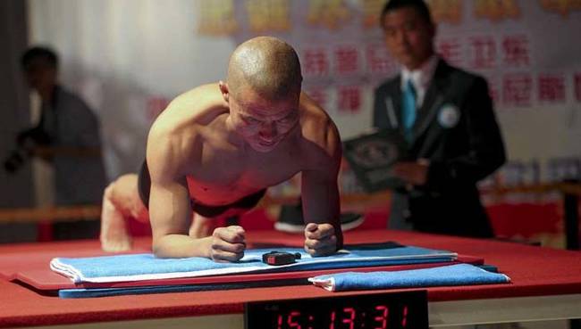 Weidong held the plank position for 4 hours and 26 minutes.