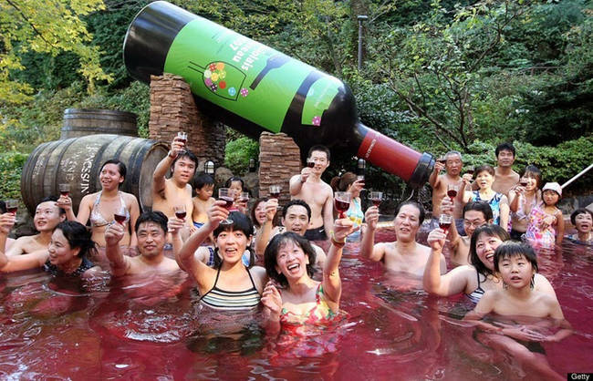 Fresh red wine is poured into the pool on a daily basis.